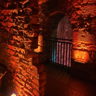 A Peek into The Snuggs, a Cosy Candlelit Space on the Upper Level of the Caves, Ideal for a Little Peace and Quiet.