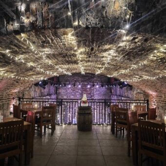 Cake on a Whisky Barrel at The Caves, Edinburgh, on the Balcony with Additional Fairy Lights.