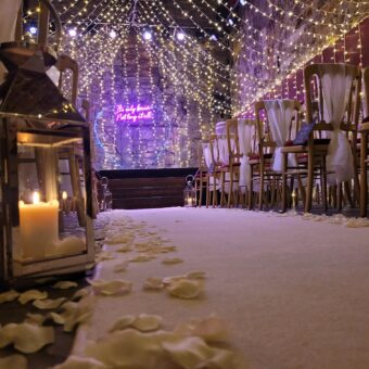 Gorgeous Wedding Ceremony Set-Up at The Caves, Edinburgh, with Additional Fairy Lights, Floor Runner and Lanterns.